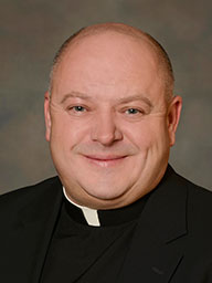 Rev. Jacek Junak, C.R.