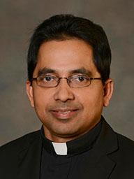 Rev. Max Lasrado