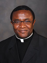 Rev. Akan S. Simon