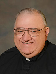 Rev. Louis F. Tosto